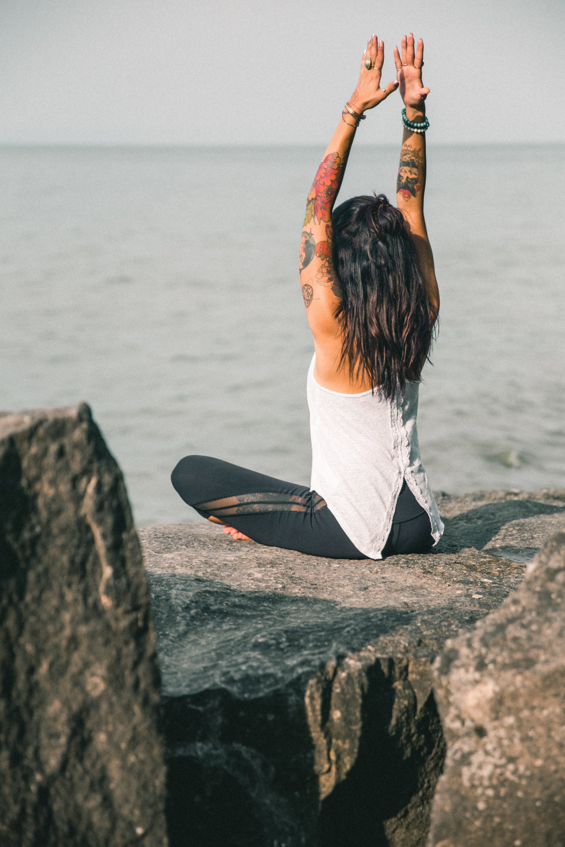 Woman doing yoga — SESA black sesame crunch supports energy and vitality for women in their 30s and 40s